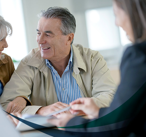 picture of a senior couple talking to an insurance agent marion ma